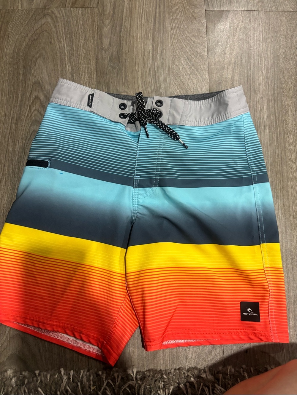 Rip Curl Gradient Stripe Board Shorts — Blue/Yellow/Red